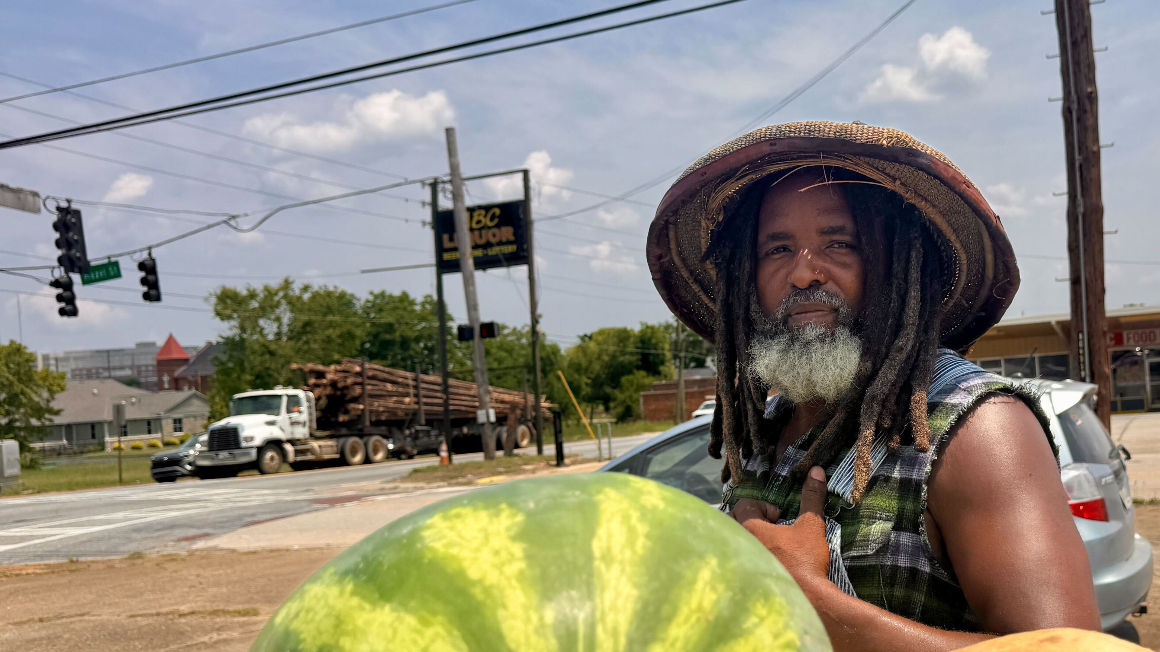 At Loy's Farmers Market in Macon, owner Loy Young tries to weather the sweltering heat as high temperatures flirt with the triple digits and heat indexes rise to dangerous levels at or above 105 degrees on Wednesday, June 25, 2025. (Joe Kovac Jr./AJC)