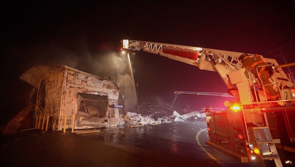 Firefighters battle a wildfire in Lacey Townships, N.J. on Tuesday, April 22, 2025. (New Jersey Department of Environmental Protection via AP)