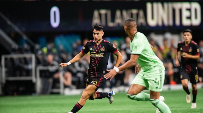 Atlanta United forward Luiz Araújo #19 dribbles the ball during the first half during the match against Austin FC at Mercedes-Benz Stadium in Atlanta, United States on Saturday July 9, 2022. (Photo by AJ Reynolds/Atlanta United)