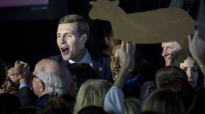 Conor Lamb, Democratic congressional candidate for Pennsylvania's 18th District, greets supporters at a Tuesday election night rally. Drew Angerer/Getty Images