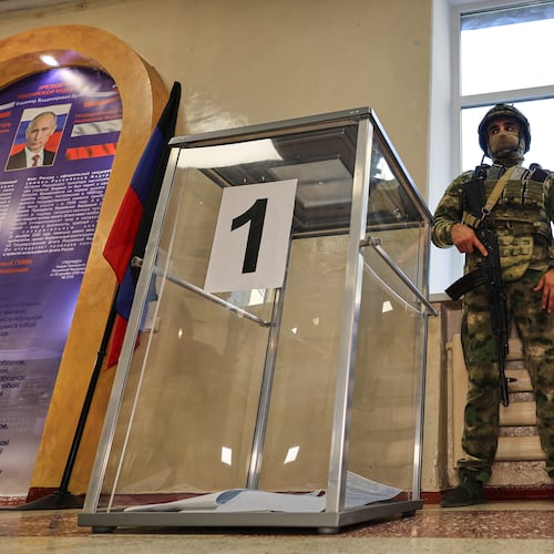 Ballot boxes are seen at a polling station during the parliamentary election in Donetsk, in the Russian-controlled part of the Donetsk region, Ukraine Friday, Sept. 18, 2026. (AP Photo)