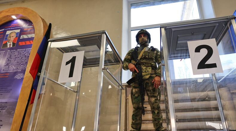 Ballot boxes are seen at a polling station during the parliamentary election in Donetsk, in the Russian-controlled part of the Donetsk region, Ukraine Friday, Sept. 18, 2026. (AP Photo)
