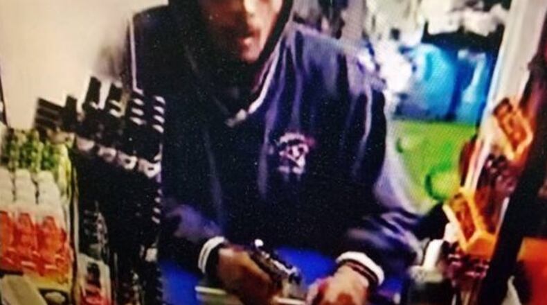 Police released a surveillance image of the armed robbery.