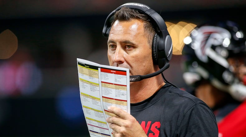 Atlanta Falcons offensive coordinator Steve Sarkisian calls a play against the Jacksonville Jaguars in the third quarter at Mercedes-Benz Stadium.