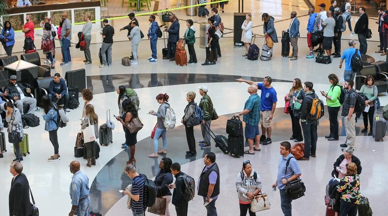 Hartsfield-Jackson Airport atrium packed on first day of security checkpoint closing.