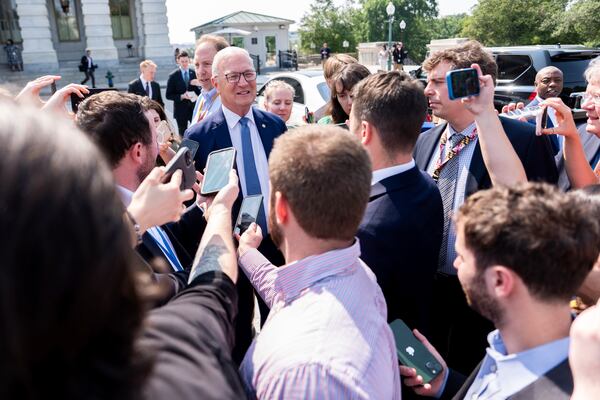 Sen. Kevin Cramer, R-N.D., walks to board a bus to the White House with other Senate Republicans for a meeting with President Donald Trump on his spending and tax bill, Wednesday, June 4, 2025, outside the U.S. Capitol in Washington. (AP Photo/Julia Demaree Nikhinson)