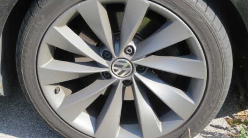 A Kumho tire on a Volkswagen vehicle is shown in this file photo. Workers at the Kumho plant in Macon voted recently to ratify their first labor contract.