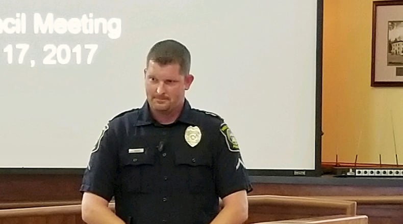 Officer Josh Riviere introduced his new K-9 partner, Finn, at the Fayetteville City Council meeting on Aug. 17. Courtesy Fayetteville Police Department