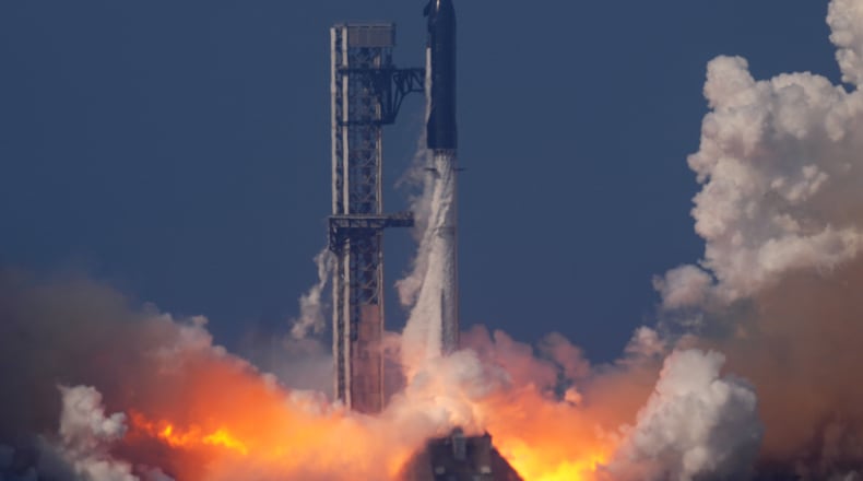 SpaceX's mega rocket Starship makes a test flight from Starbase, Texas, Friday, May 22, 2026. (AP Photo/Eric Gay)