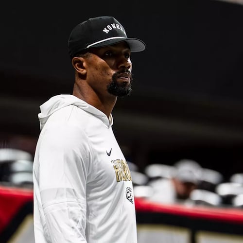 Former Northwestern football player Quentin Davie, who was Hebron Christian's linebackers coach last season, was named the Lions' head coach in January. (Courtesy)