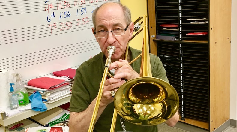 David Williams, who describes himself as “an old trombone player,” is retiring after 34 years as band director at Renfroe Middle School. Bill Banks for the AJC
