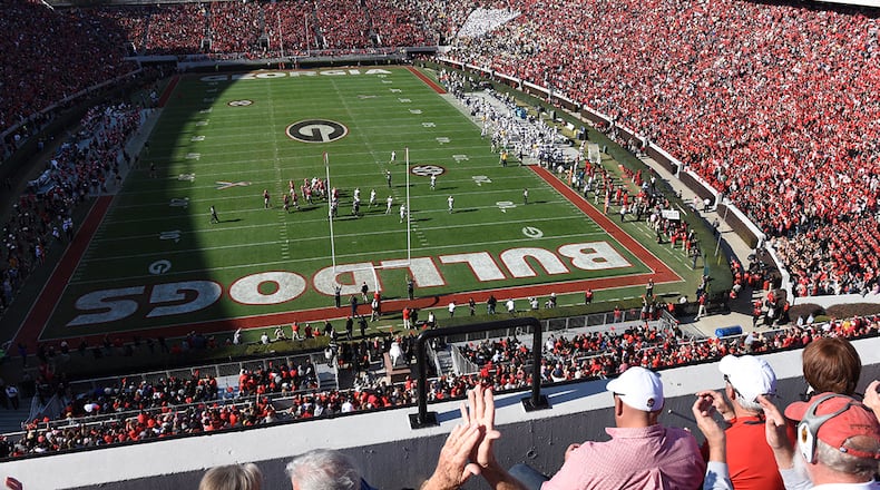 Georgia fans cheer during a game at Sanford Stadium.