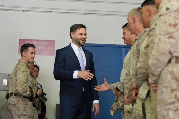 Vice President JD Vance visits with troops at the Wilshire Federal Building on Friday, June 20, 2025, in Los Angeles. (AP Photo/Jae C. Hong)