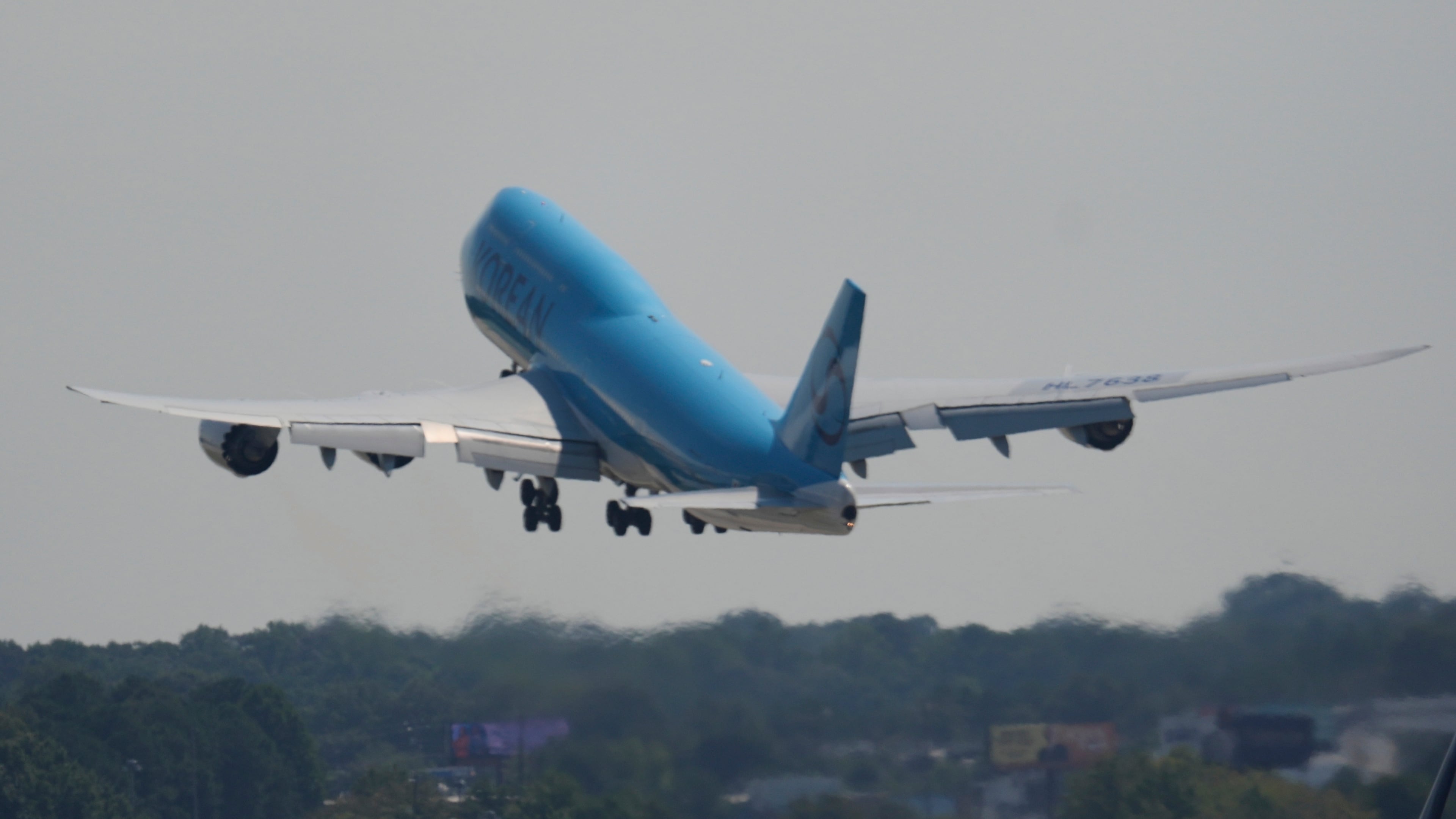 A Korean Air charter plane carrying Korean workers detained in immigration raid at Georgia factory leaves Hartsfield-Jackson International Airport in Atlanta bound for South Korea, Thursday, Sept. 11, 2025. (AP Photo/George Walker IV)