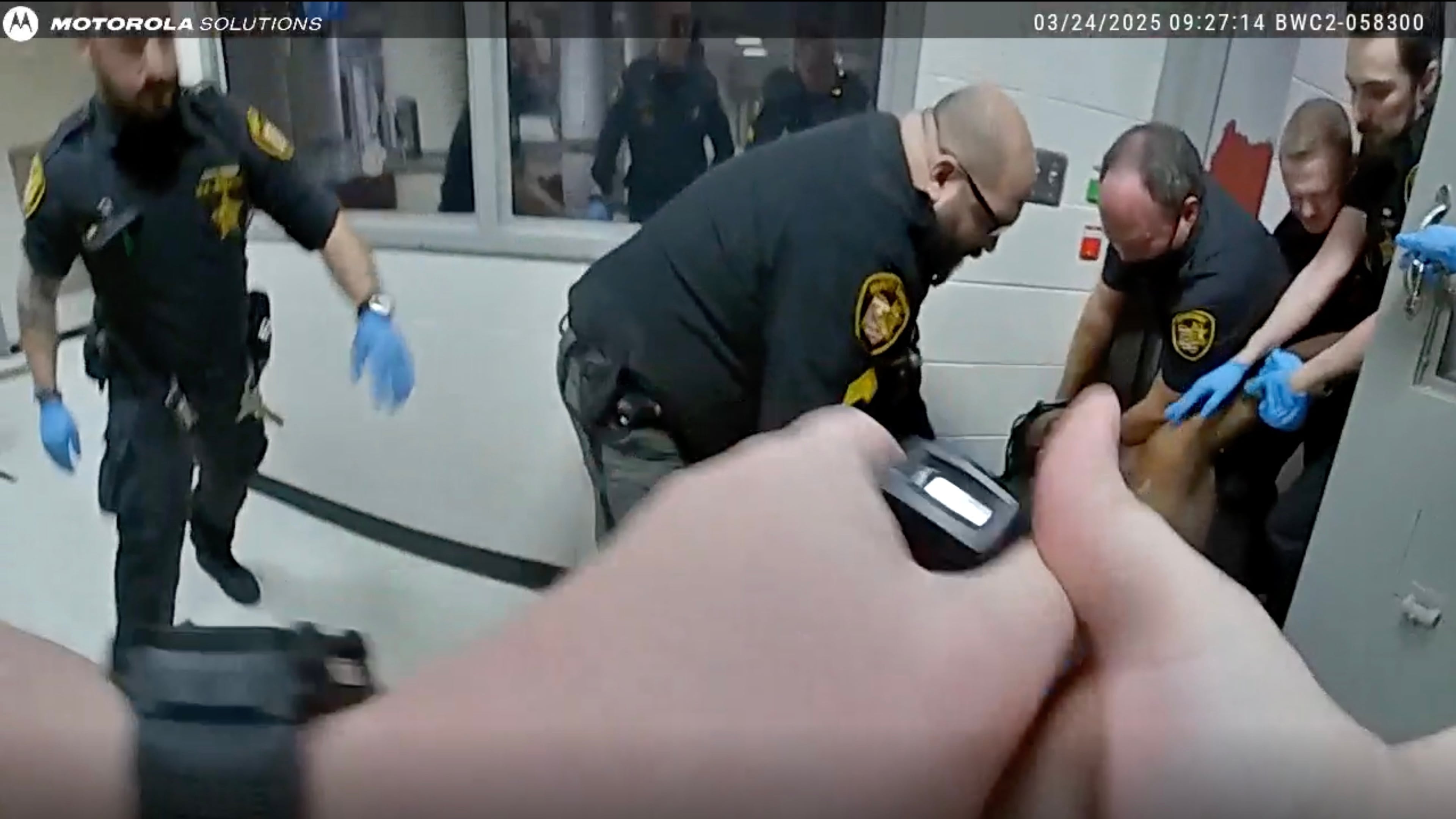 This image taken from video released by the Montgomery County Sheriff's Office shows law enforcement apprehending Christian Black inside the Montgomery County Jail on March 24, 2025, in Dayton, Ohio. (Montgomery County Sheriff's Office via AP)