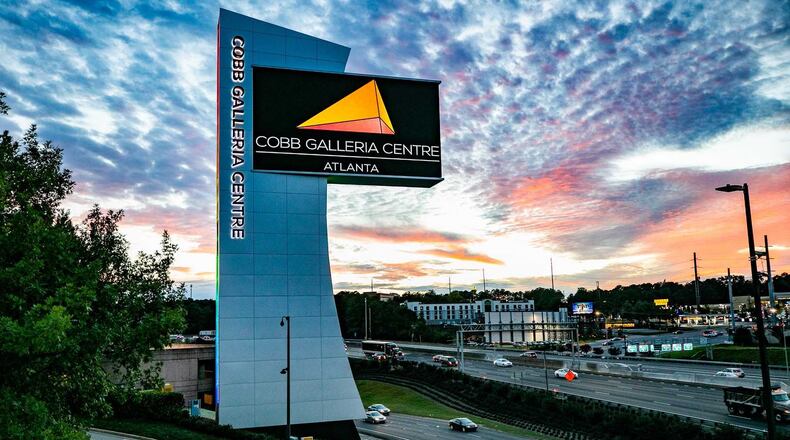 This is the new Cobb Galleria Centre marquee that now stands over I-285 near SunTrust Park. The sign was lit the night of Wednesday, Oct. 17, 2018.