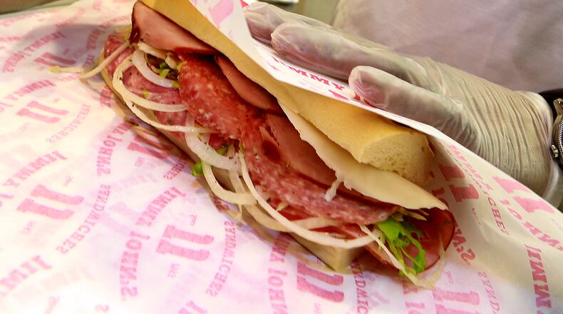 An Italian Sub at Jimmy John's gets wrapped to go.