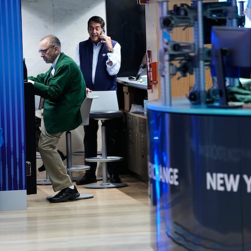 Traders work on the floor at the New York Stock Exchange in New York, Monday, July 6, 2026. (AP Photo/Seth Wenig)