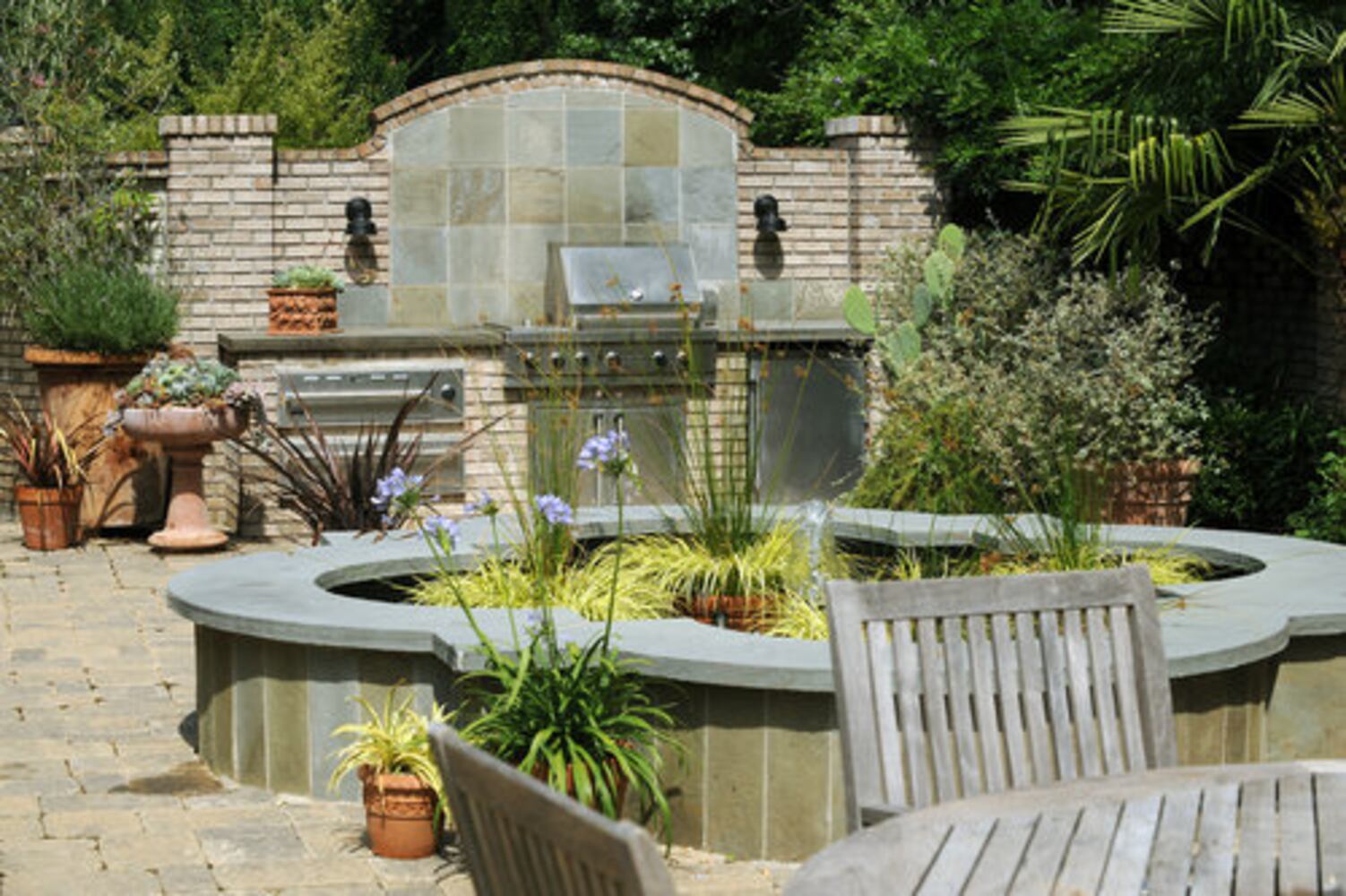 A wooded Druid Hills garden planted with TLC