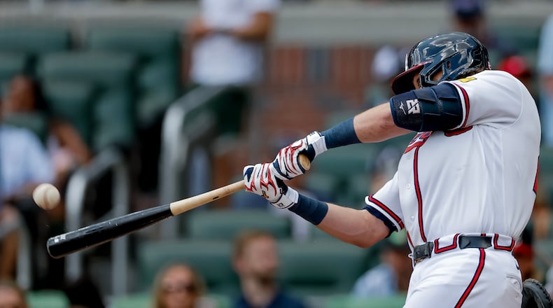 Atlanta Braves' Austin Riley hits a solo home run against the Texas Rangers during the second inning of a baseball game, Sunday, July 19, 2026, in Atlanta. (Erik S. Lesser/AP)