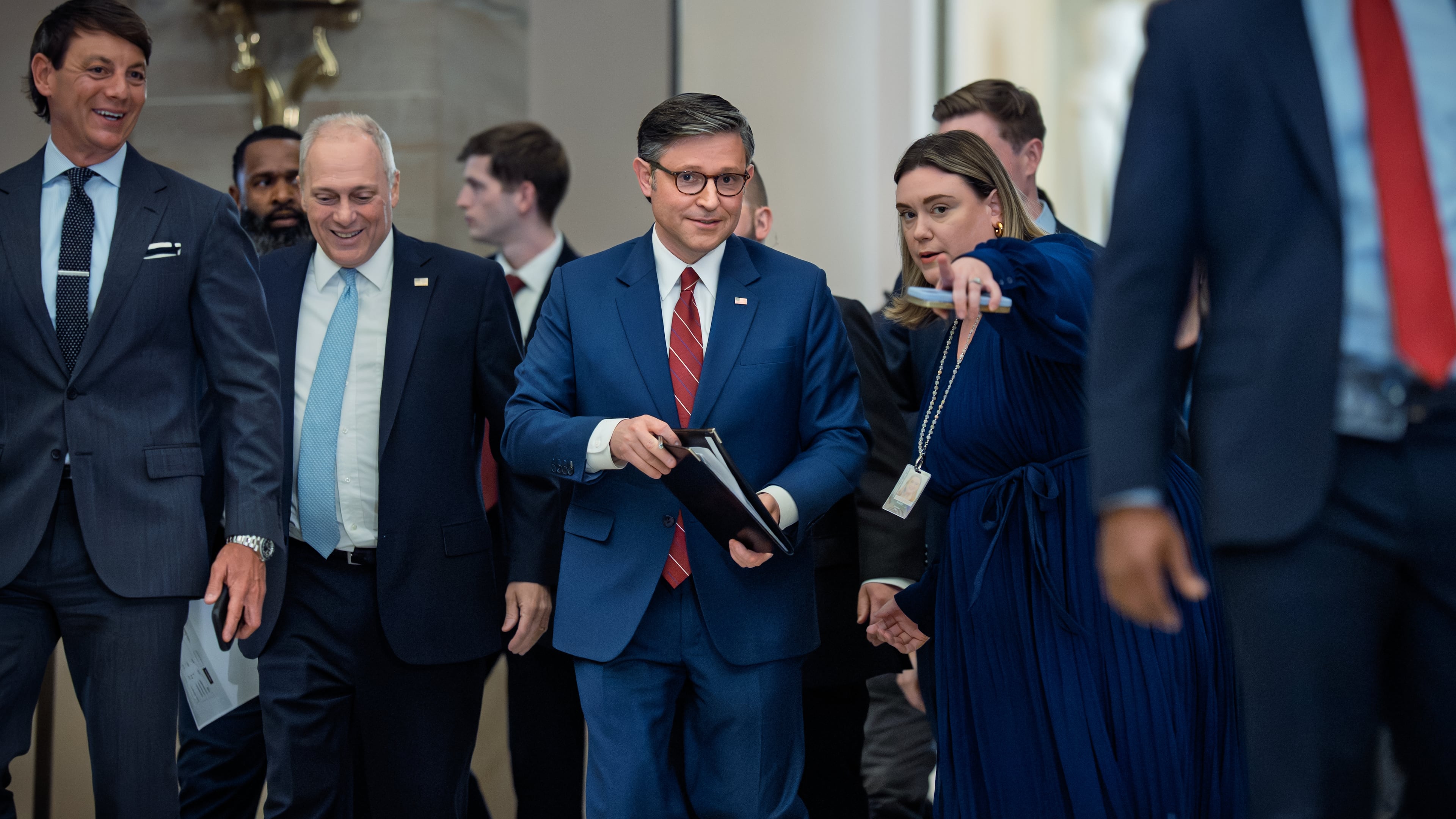 Speaker of the House Mike Johnson, R-La., joined at left by Majority Leader Steve Scalise, R-La., arrives to speak with reporters after the final vote to bring the longest government shutdown in history to an end, at the Capitol in Washington, Wednesday, Nov. 12, 2025. (AP Photo/J. Scott Applewhite)