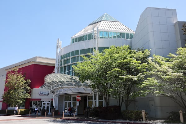 People enter and exit North Point Mall in Alpharetta on April 10, 2026. (Arvin Temkar/AJC)