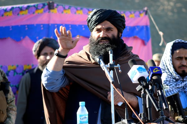 FILE - Acting interior minister Sirajuddin Haqqani, speaks during the funeral prayers of Khalil Haqqani, the minister for refugees and repatriation, during his funeral procession in eastern Paktia province, Afghanistan, Dec. 12, 2024. (AP Photo/Saifullah Zahir, File)