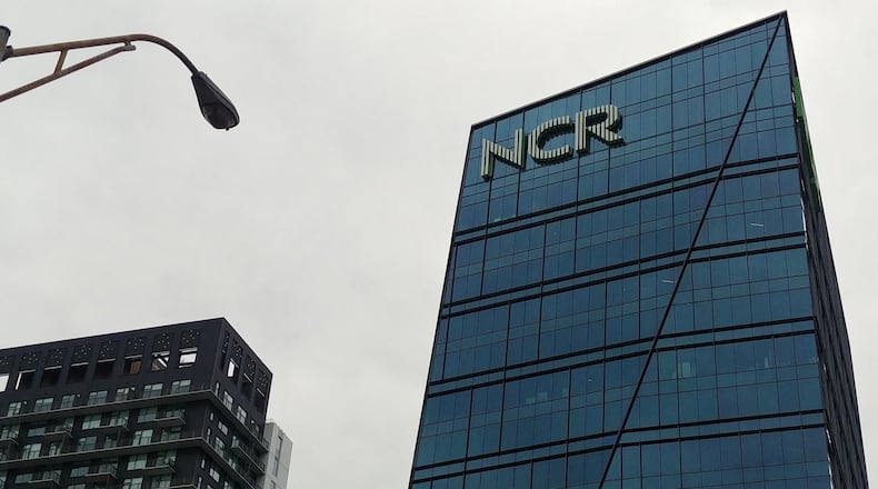 The NCR headquarters building in Midtown Atlanta next to the Downtown Connector in 20In 2023 the company split in two. On Tuesday, one of the successor companies sold its digital banking division. (Andy Peters/The Atlanta Journal-Constitution/TNS)