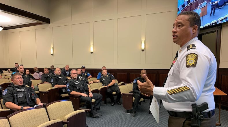 Fulton County Sheriff Patrick Labat recently spoke with, and deputized, officers from the Alpharetta Police Department. (Courtesy City of Alpharetta)