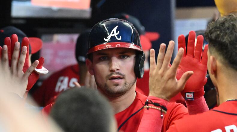 Braves third baseman Austin Riley celebrates after hitting three run home run in the third inning at Truist Park on Friday, August 19, 2022. (Hyosub Shin / Hyosub.Shin@ajc.com)