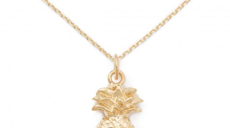 The 14K solid gold pineapple pendant costs $250 from Delicacies Jewelry.