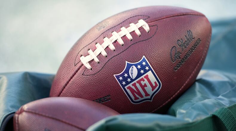 FILE - Footballs are seen before an NFL football game in Philadelphia on Jan. 4, 2026. (AP Photo/Matt Slocum, File)