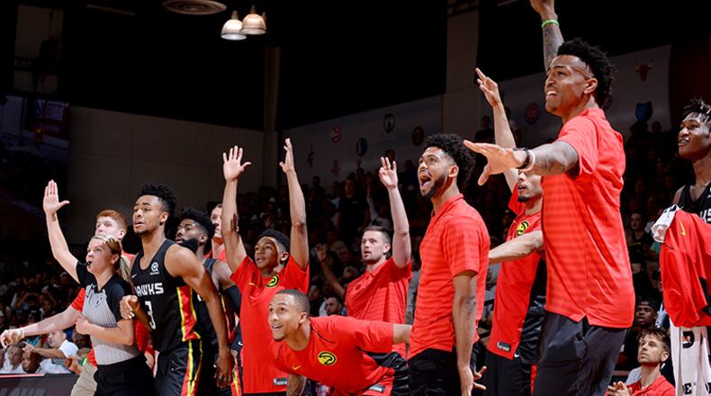 MIAMI, FL - OCTOBER 1: Dennis Schroder #17 of the Atlanta Hawks handles the ball during the preseason game against the Miami Heat on October 1, 2017 at American Airlines Arena in Miami, Florida. NOTE TO USER: User expressly acknowledges and agrees that, by downloading and or using this Photograph, user is consenting to the terms and conditions of the Getty Images License Agreement. Mandatory Copyright Notice: Copyright 2017 NBAE (Photo by Issac Baldizon/NBAE via Getty Images)