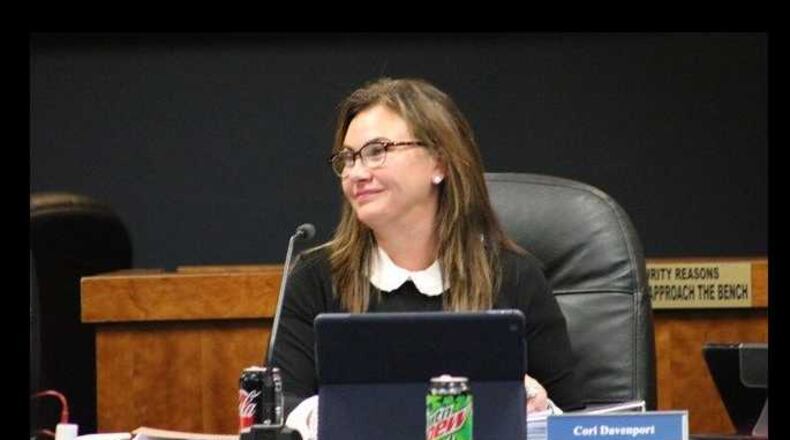 Cori Davenport didn't seek re-election as a Johns Creek council member. Her final vote was "yes" to donate her entire four-year salary to charity.