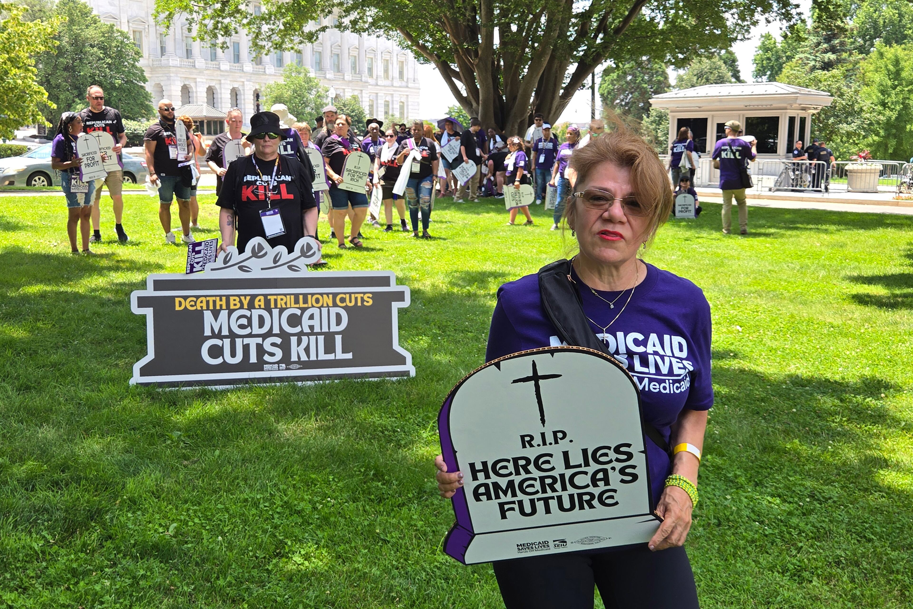Josephine Rios, who works in nursing, was among those recently protesting cuts to Medicaid outside the U.S. Capitol in Washington.