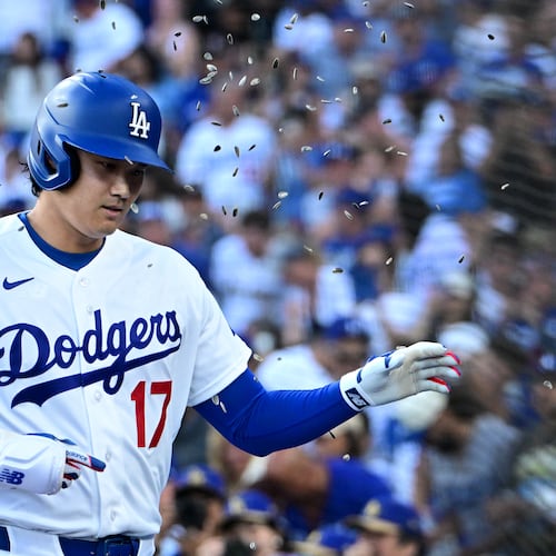 Los Angeles Dodgers Shohei Ohtani (17) celebrates his solo home run against the Seattle Mariners during the first inning of a baseball game Tuesday, July 28 2026, in Los Angeles. (AP Photo/Wally Skalij)