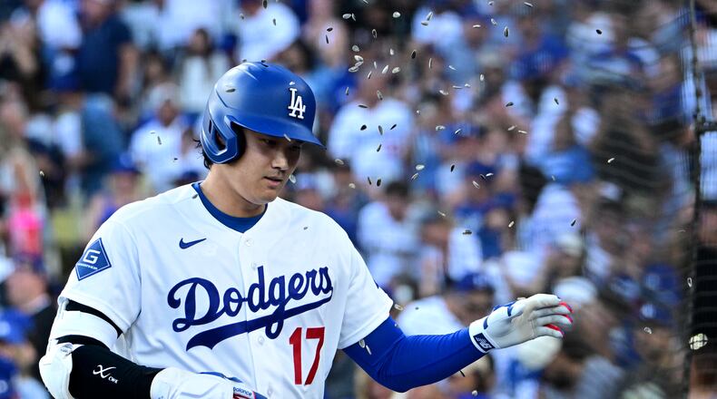 Los Angeles Dodgers Shohei Ohtani (17) celebrates his solo home run against the Seattle Mariners during the first inning of a baseball game Tuesday, July 28 2026, in Los Angeles. (AP Photo/Wally Skalij)