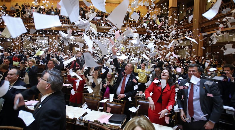 March 28, 2013 - Atlanta, Ga: Paper flies in the air after House Majority Leader Larry O'Neal, R-Bonaire, (not pictured) said, "Sine Die," to signify the end of Legislative Day 40 in the House Chambers at the Capitol Thursday night in Atlanta, Ga., March 28, 2013. Thursday is the last day of the 2013 Legislative Session. JASON GETZ / JGETZ@AJC.COM A scene from the final day of the 2013 Georgia Legislature, when lawmakers let the papers fly. AJC Political Insider helps reader sift and sort the world of Georgia politics, politicians and elections.