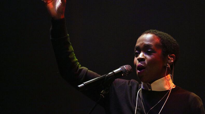 MELBOURNE, AUSTRALIA - MAY 21: Lauryn Hill performs live for fans at Palais Theatre on May 21, 2014 in Melbourne, Australia. (Photo by Graham Denholm/Getty Images)