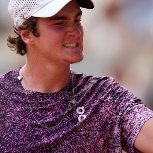 Joao Fonseca of Brazil reacts as he plays against Novak Djokovic of Serbia during their third round men's singles tennis match at the French Open tennis tournament in Paris, Friday, May 29, 2026. (AP Photo/Christophe Ena)