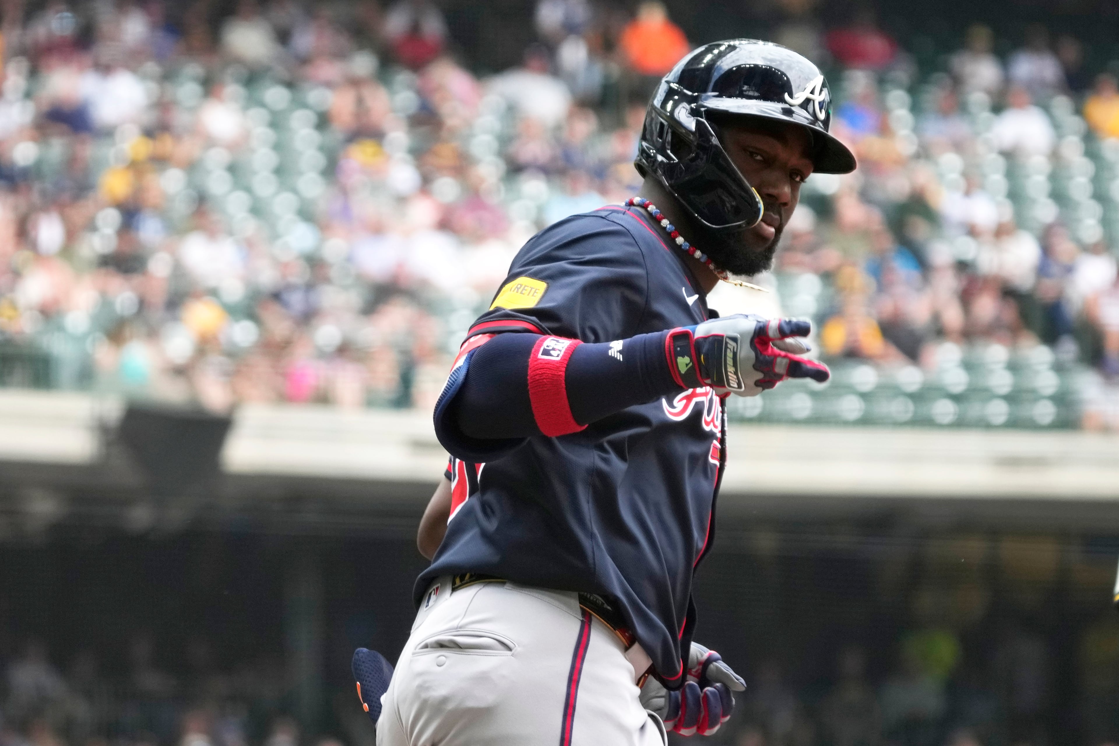 Atlanta Braves' Michael Harris II (23) reacts to hitting a two-run home run during the second inning of a baseball game against the Milwaukee Brewers, Wednesday, June 11, 2025, in Milwaukee. (AP Photo/Kayla Wolf)