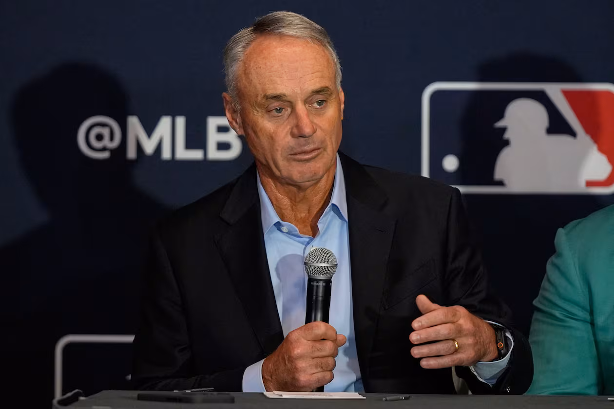 FILE - Rob Manfred, commissioner of Major League Baseball answers questions during a news conference at the MLB winter meetings, Dec. 8, 2025, in Orlando, Fla. (AP Photo/John Raoux, file)