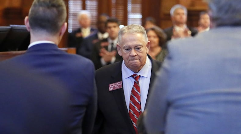 House Speaker David Ralston leaves the well to a standing ovation on Monday after he addressed accusations that he has abused his authority by delaying court cases for clients of his law practice. Some Republican lawmakers signed onto a resolution calling for Georgia House Speaker David Ralston to resign over the issue. Bob Andres / bandres@ajc.com