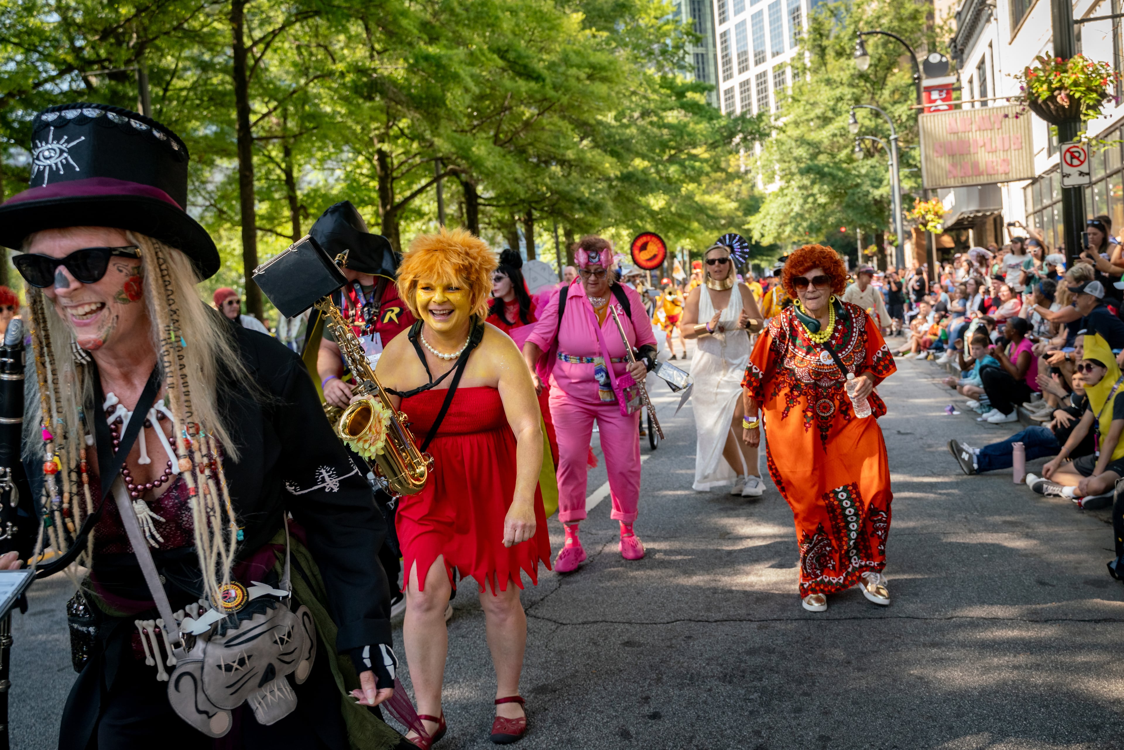 Thousands lined up along Peachtree Street on Saturday morning, August 31, 2024, for the annual Dragon Con parade in Atlanta. (Ben Hendren for The Atlanta Journal-Constitution)