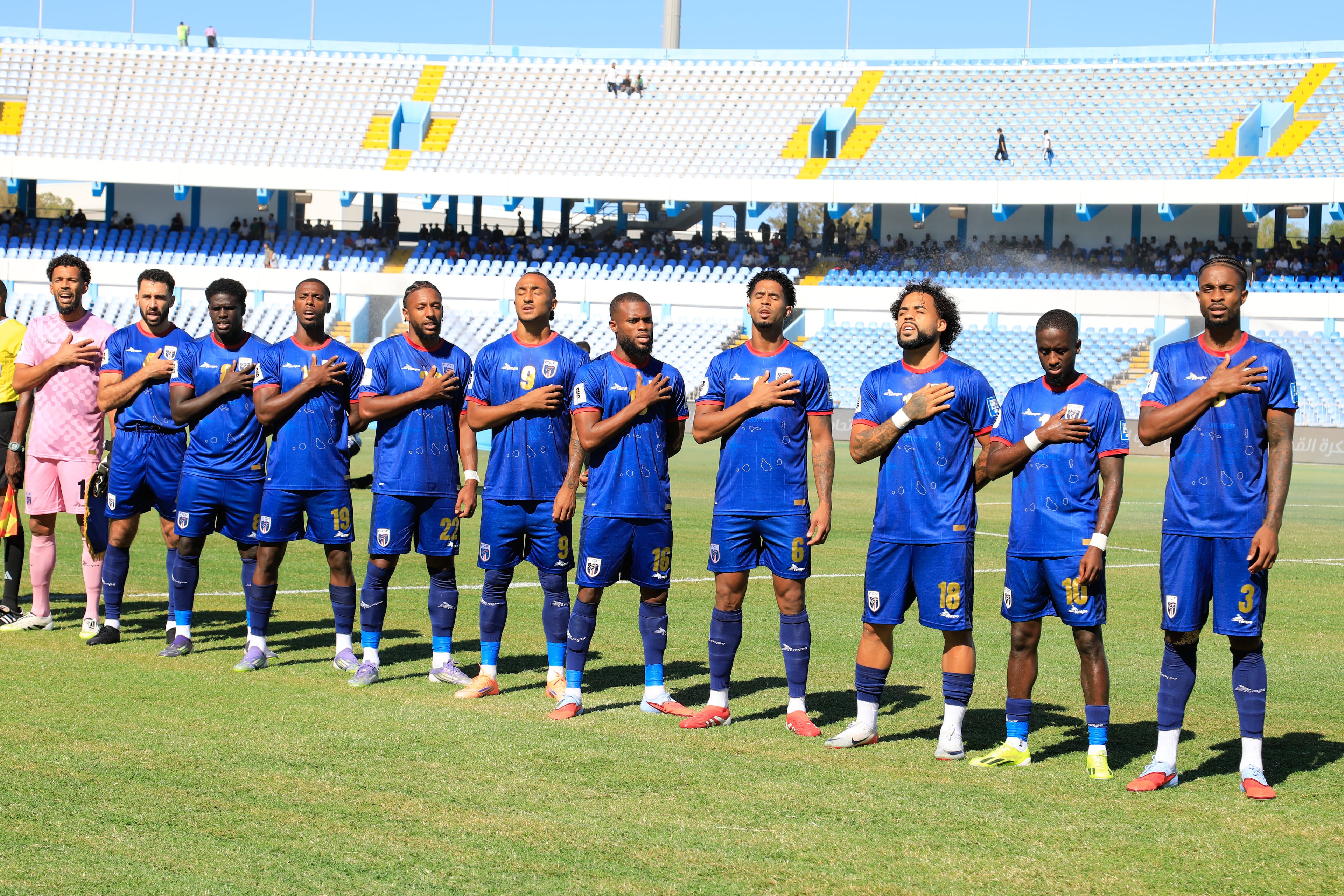 Cape Verde players stand for the national anthem during the World Cup 2026 African qualifier Group D soccer match between Libya and Cape Verde in Tripoli, Libya, Wednesday, Oct. 8, 2025. (Yousef Murad/AP)