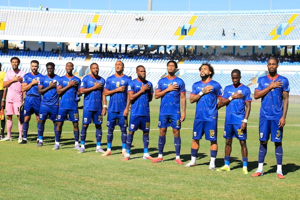 Cape Verde players stand for the national anthem during the World Cup 2026 African qualifier Group D soccer match between Libya and Cape Verde in Tripoli, Libya, Wednesday, Oct. 8, 2025. (Yousef Murad/AP)