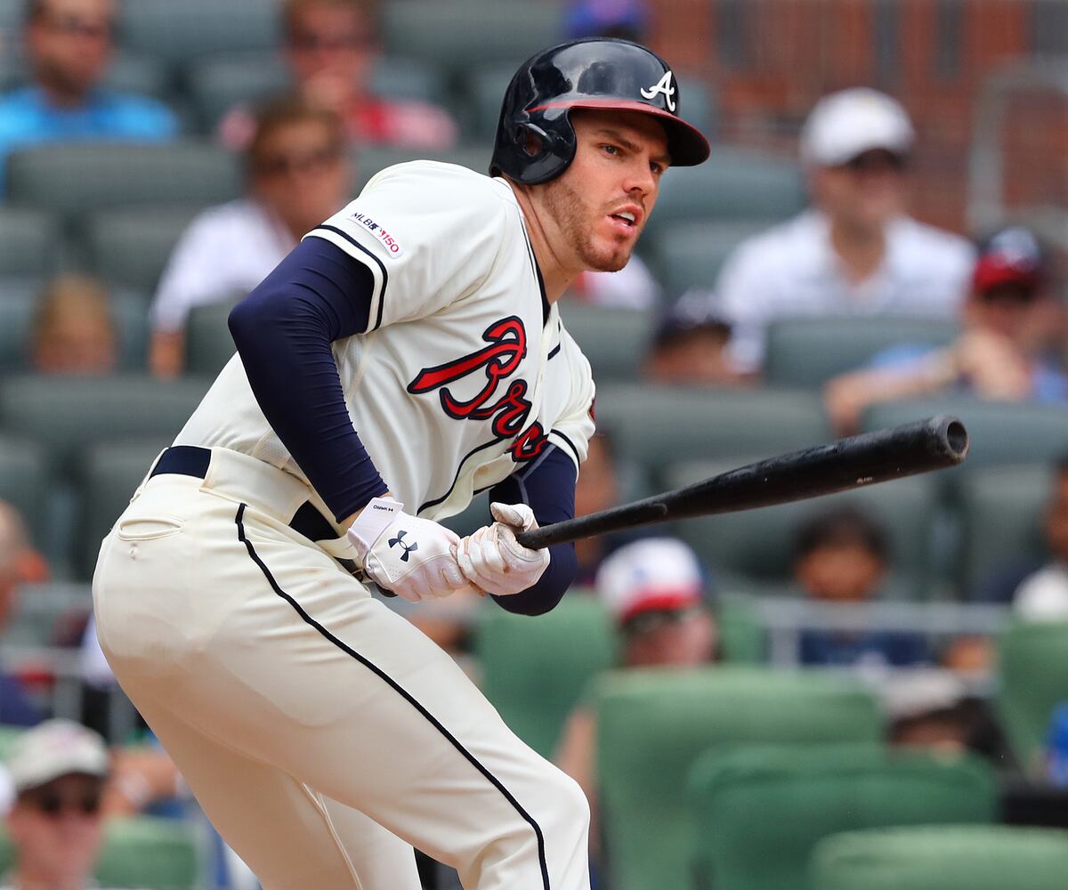 Photos: Freeman joins list of all-time great Braves hitters