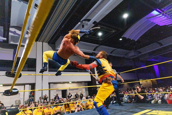 Dressed in Wolverine costumes, Dragon Con Wrestling's high-flying performers put on a show for convention goers. (Courtesy of Dragon Con)