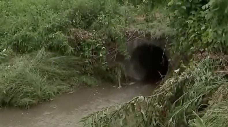 Ben Smith estimates he was trapped in the pipe for about a minute before washing out in a small creek on the other side of the road. (WPXI.com)