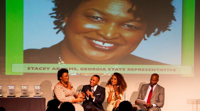 Stacey Abrams, the House Minority Leader for the Georgia General Assembly and State Representative for the 89th House District was honored Saturday at The Root 100 Award s Dinner at Espace in New York City. Each year, The Root recognizes 100 exceptional African Americans, Ages 25-45, for their successes and the positive impacts that they have made in the lives of others. Participating in a panel discussion, from left: Stacey Abrams, Rashad Robinson (Executive Director, Color of Change), Janet Mock (Contributing Editor, Marie Claire and advocate for transgender rights), Van Jones (Co-host of CNN's Crossfire)
